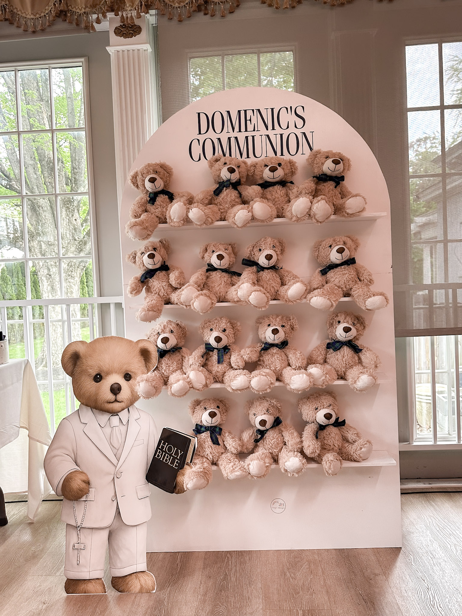 Custom treat wall with shelves of personalized favors